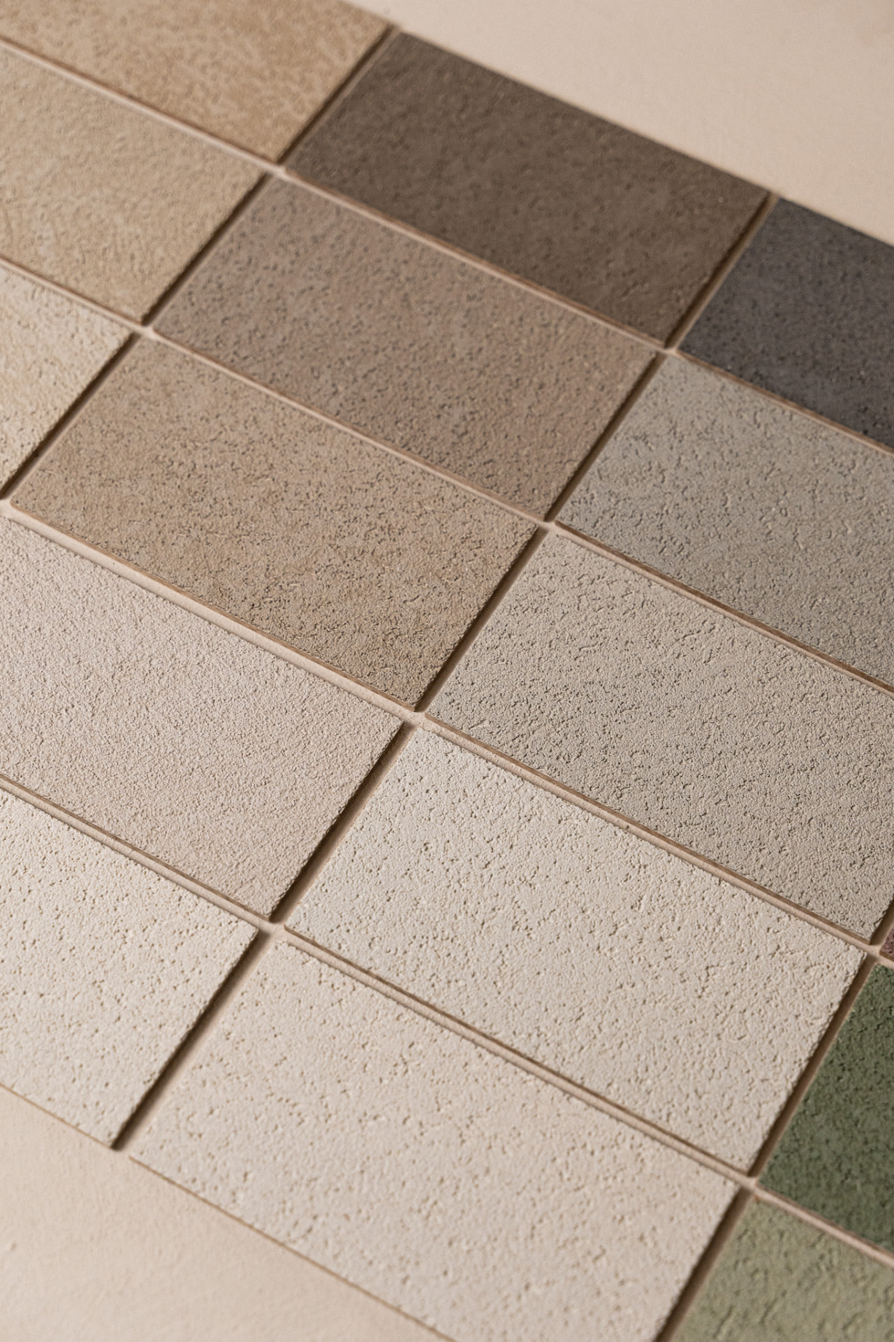 Physical Limestucco samples in different colours from the range.